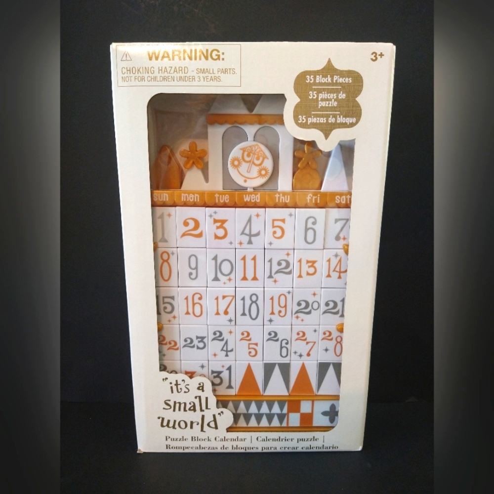 2023 Disney Parks It’s A Small World Puzzle Block Calendar NEW Gold And White